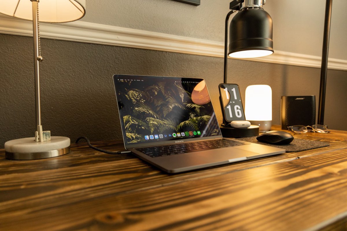 A laptop open on a desk